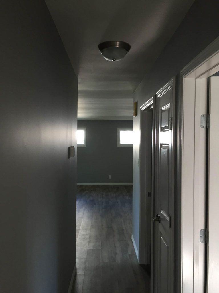 Hallway renovation with wood floors