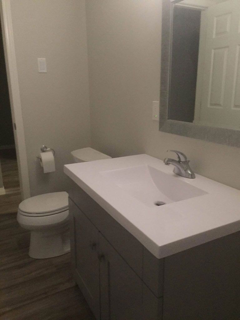a modern sink in a newly renovated bathroom